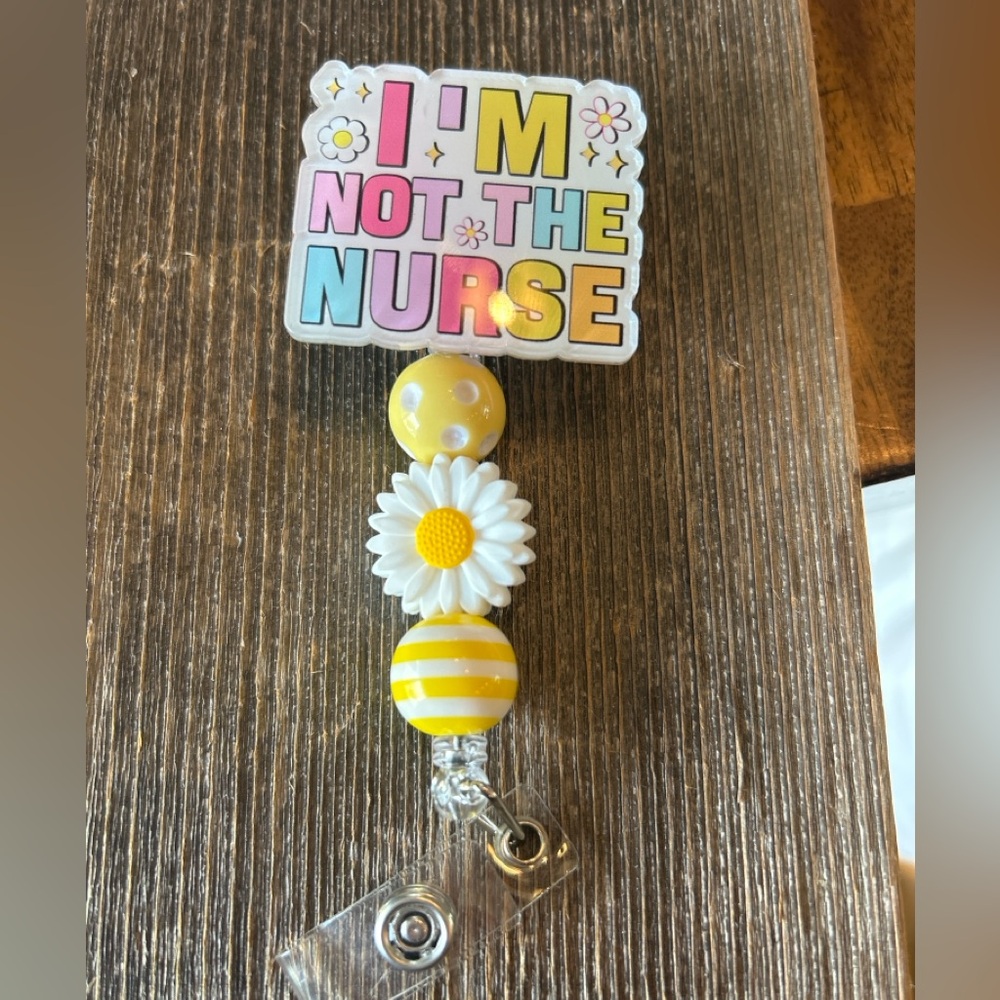 Yellow and White Daisy Badge Reel
